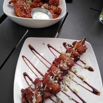 Simmer - Bacon Wrapped Medjool Dates and Asian Hot Cauliflower Wings - Cocktail Bars Near Me - Fort Collins, Colorado Simmer - Bacon Wrapped Medjool Dates and Asian Hot Cauliflower Wings - Cocktail Bars Near Me - Fort Collins, Colorado