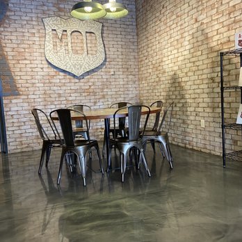 MOD Pizza - tables and chairs in a restaurant - Fast Food Near Me - Cary, North Carolina