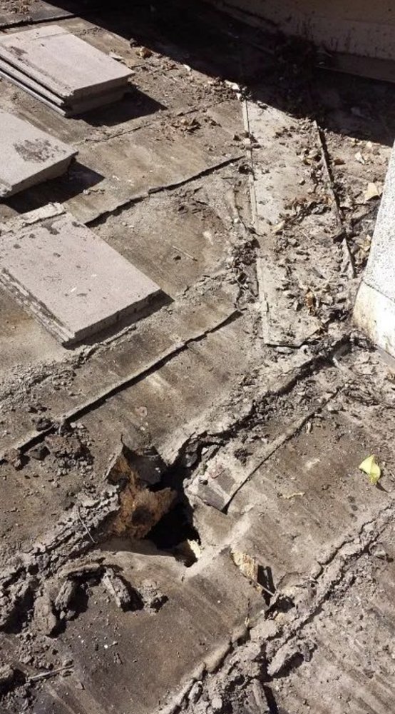 Slide of Romero's Roofing