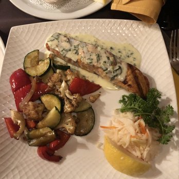 Skovorodka - Salmon in spinach sauce and grilled veggies - Russian Near Me - Brooklyn, New York Skovorodka - Salmon in spinach sauce and grilled veggies - Russian Near Me - Brooklyn, New York