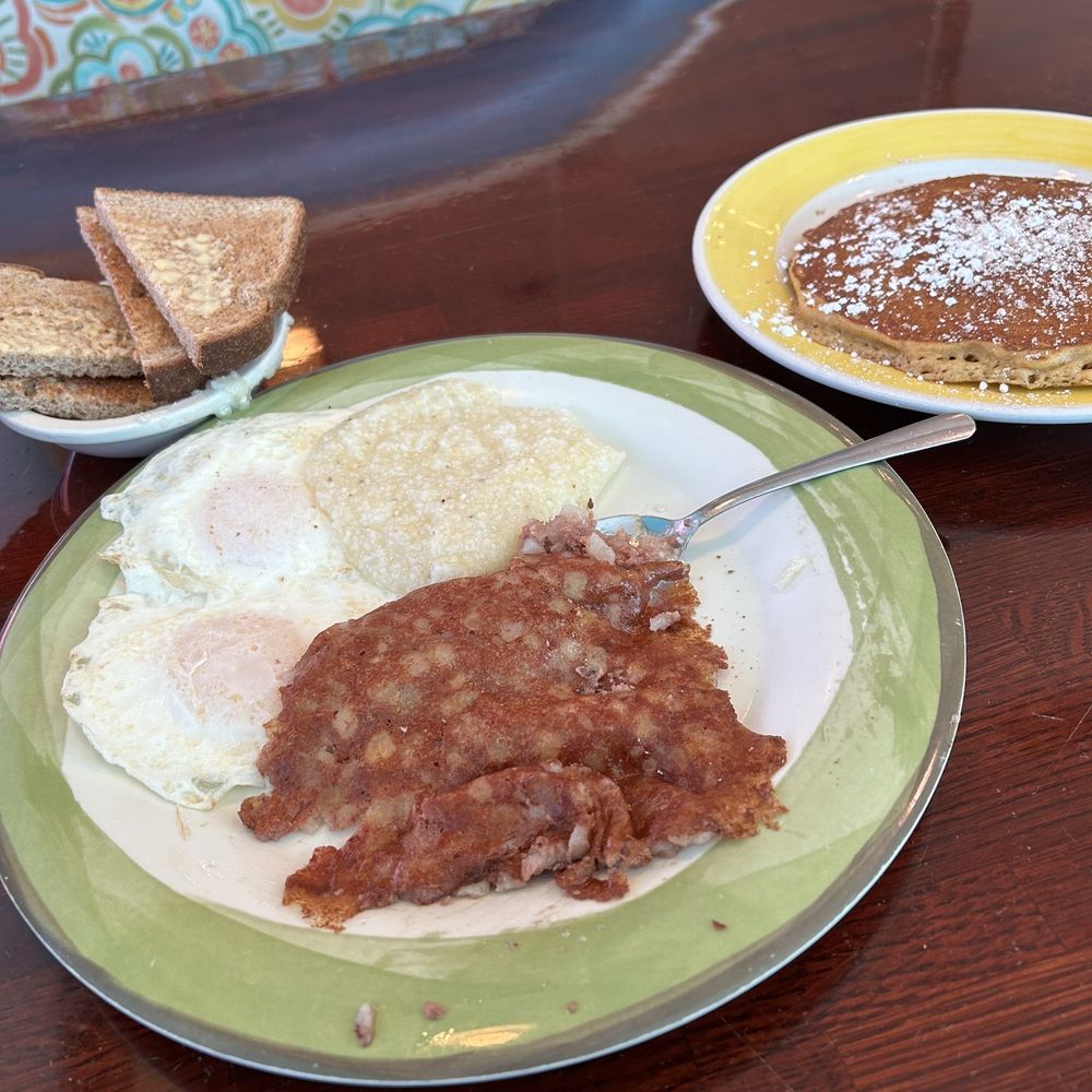 Eggs over easy, grits, corned beef hash, aaaand....Pumpkin Pancakes! This is life! Eggs over easy, grits, corned beef hash, aaaand....Pumpkin Pancakes! This is life!