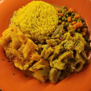 Hillside Terrace - conch with 3 sides: Mac n cheese, seasoned rice and peas & carrots. - Caribbean Near Me - Cruz Bay, Virgin Islands