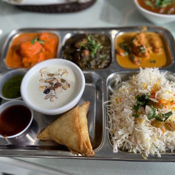 IndianBistro14 - a tray of food - Indian Near Me - Arlington, Texas