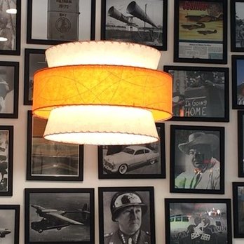Red's Giant Hamburg - Photo Wall at Red's and art deco lamp. - Burgers Near Me - Springfield, Missouri Red's Giant Hamburg - Photo Wall at Red's and art deco lamp. - Burgers Near Me - Springfield, Missouri