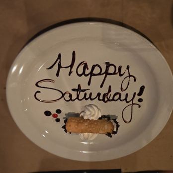 Nabruzzi Trattoria - Birthday canoli for the woman who did not want anything special for the occasion. - Italian Near Me - Lutz, Florida Nabruzzi Trattoria - Birthday canoli for the woman who did not want anything special for the occasion. - Italian Near Me - Lutz, Florida