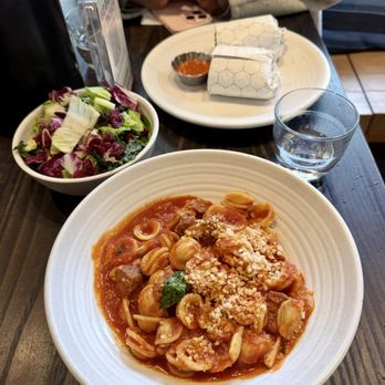 Rad Radish - orecchiette & spicy sausage arrabbiata pasta, side salad - Vegan Near Me - San Francisco, California
