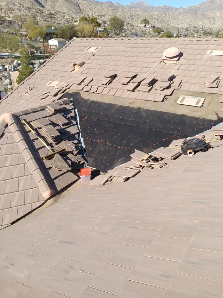 Slide of Moses Roofing