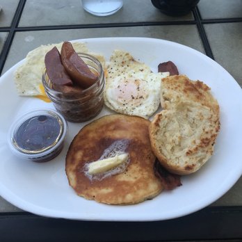 The Kitchen Table - 2 Eggs over medium, Bacon, Pancake, Fried apples and s grilled biscuit. - Cafes Near Me - Gasburg, Virginia