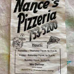 Nances Pizzaria - Menu cover (sorry, we got it wet!)