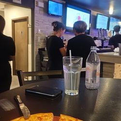 Pizzico Ristorante & Martini Bar - Lauren on the left speaking to anonymous person