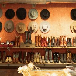 Cowgirl Cash - Our vintage Cowgirl Boot wall. It changes almost daily.