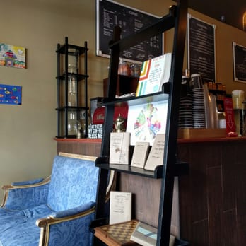 Red Pipes Cafe - The plush cushiony seat and random books for sale. - Coffee & Tea Near Me - Forest Hills, New York Red Pipes Cafe - The plush cushiony seat and random books for sale. - Coffee & Tea Near Me - Forest Hills, New York