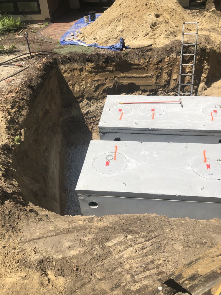 Slide of EmRay Excavating