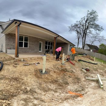 Hatchie Tree Service - Hatchie Tree Service working on deck in back yard of Olive Branch, MS. - Tree Services Near Me - Hernando, Mississippi