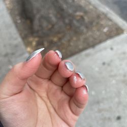 J&V Nails Studio - The tip of my middle finger was filed TOO much. The pointer finger is TOO THICK. Excess polish not cleaned.