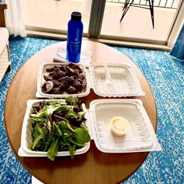 Our 14-ounce steak, rice, and salad lunch plate.
