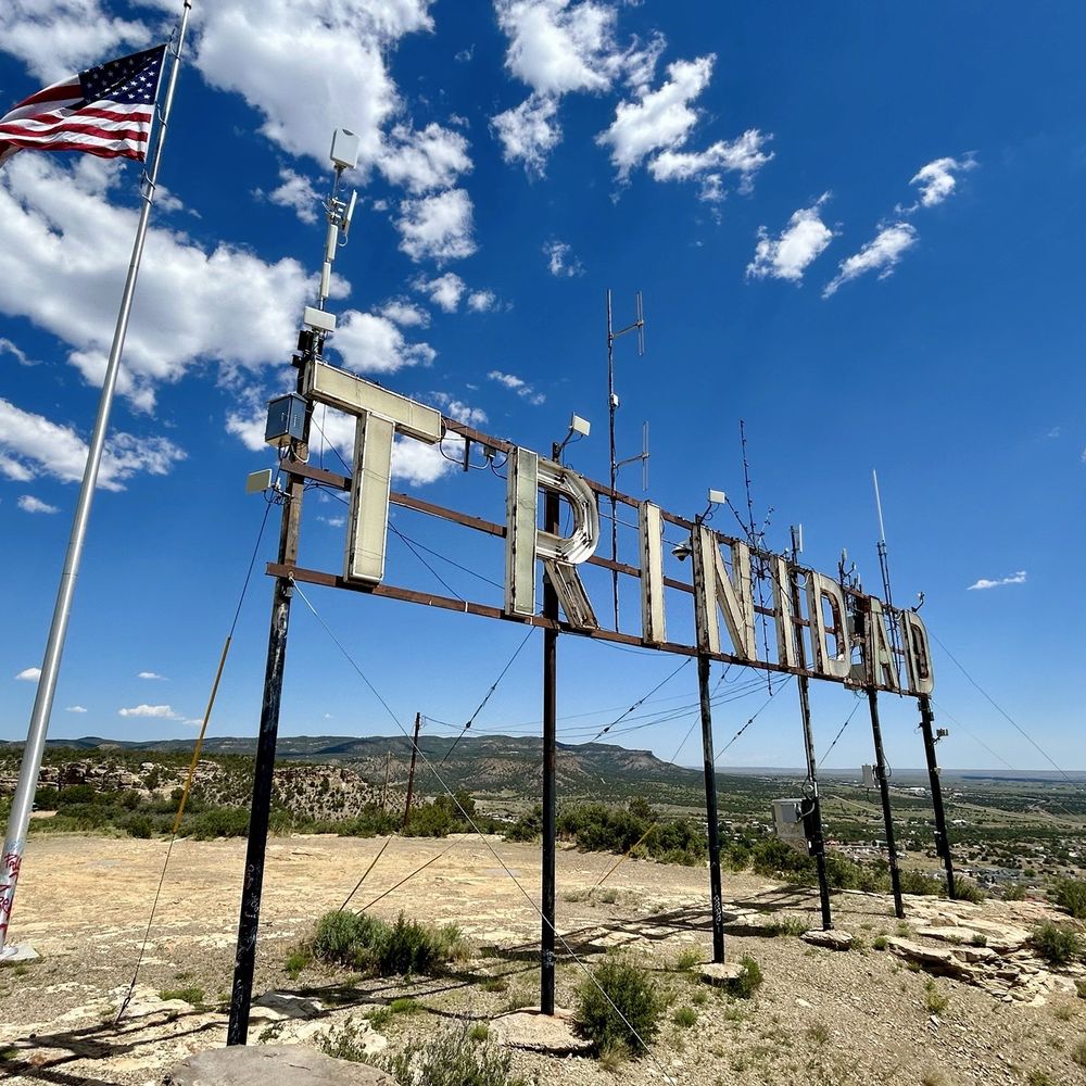 Simpson's Rest - This landmark Trinidad Sign and American flag is a great introduction into Simpson's Rest observation point. - Hiking Near Me - Trinidad, Colorado