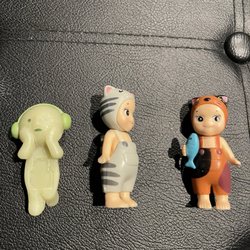 Old beijing - Details are clearly off, waxy material used instead of the usual hard plastic, and they are VERY poor quality.