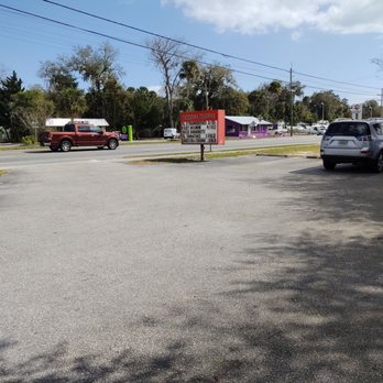 Perrine's Produce - a parking lot with cars and trucks - Farmers Market Near Me - New Smyrna Beach, Florida Perrine's Produce - a parking lot with cars and trucks - Farmers Market Near Me - New Smyrna Beach, Florida