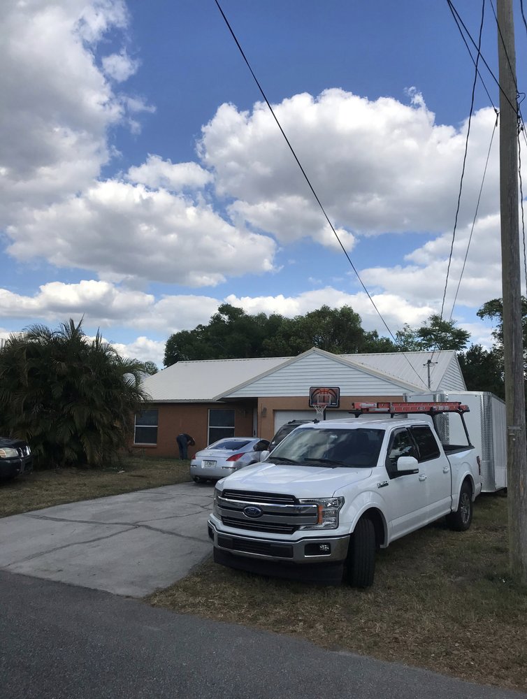 Slide of Menzel Roofing Services