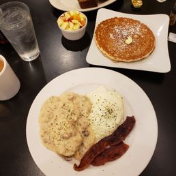 a breakfast of pancakes, eggs and bacon a breakfast of pancakes, eggs and bacon