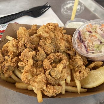 Butler's Flat - Fried clam on fries and coleslaw - Seafood Near Me - Port Washington, New York Butler's Flat - Fried clam on fries and coleslaw - Seafood Near Me - Port Washington, New York