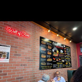 Chai Shai - a menu on a brick wall - Pakistani Near Me - Houston, Texas Chai Shai - a menu on a brick wall - Pakistani Near Me - Houston, Texas