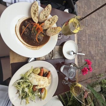 The Drunken Horse - Sea bass and  beef bourguignon. - Wine Bars Near Me - St. Augustine, Florida