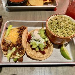 Americano Taco and Carne Asada  tacos with rice.