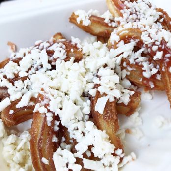 Amara Chocolate & Coffee - AMARA CHOCOLATE & COFFEE * churro drizzled with dulce de lèche, queso fresco, and guava. - Coffee & Tea Near Me - Pasadena, California