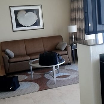 Radisson Suite Hotel Oceanfront - Looking at living room side from foot of bed. - Hotels Near Me - Indialantic, Florida Radisson Suite Hotel Oceanfront - Looking at living room side from foot of bed. - Hotels Near Me - Indialantic, Florida