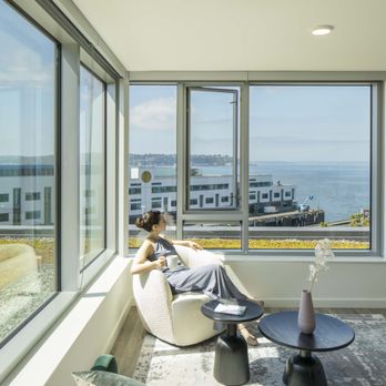 10 Clay Apartments - Catch sweeping views of the Olympic Mountains and Seattle's waterfront from the floor-to-ceiling windows, fitted with custom roller shades. - Apartments Near Me - Seattle, Washington 10 Clay Apartments - Catch sweeping views of the Olympic Mountains and Seattle's waterfront from the floor-to-ceiling windows, fitted with custom roller shades. - Apartments Near Me - Seattle, Washington