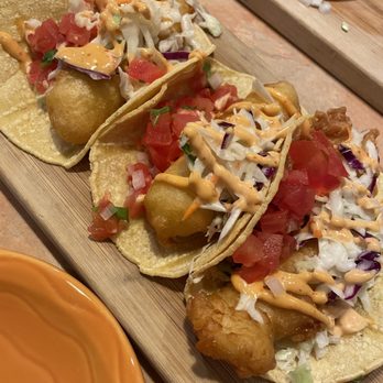 Chilangos Mexican Restaurant - three tacos on a cutting board - Mexican Near Me - Belleville, Ontario Chilangos Mexican Restaurant - three tacos on a cutting board - Mexican Near Me - Belleville, Ontario