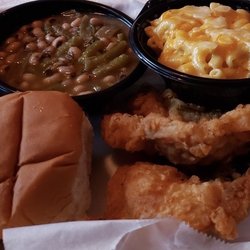 Mrs. Betty’s Fried Chicken Restaurant - Fried pork chop, field peas and snaps, Mac n cheese, and a roll