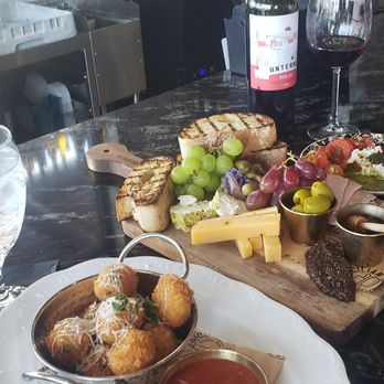 The Sicilian Butcher - Arancini balls which a delicious marinara sauce! - Wine Bars Near Me - San Antonio, Texas The Sicilian Butcher - Arancini balls which a delicious marinara sauce! - Wine Bars Near Me - San Antonio, Texas
