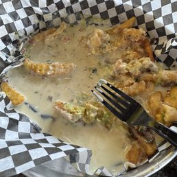 It was like fire soup. Asada fries sat It was like fire soup. Asada fries sat
