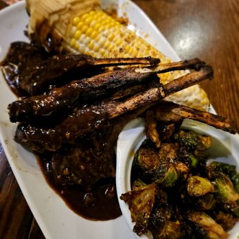 LongHorn Steakhouse - Lamb chops, brussel sprouts, grilled corn on the cob. - Steakhouses Near Me - East Point, Georgia