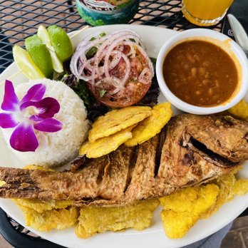 The Chimi Spot - Pescado boca chica with tostones and rice and beans. - Dominican Near Me - Orlando, Florida The Chimi Spot - Pescado boca chica with tostones and rice and beans. - Dominican Near Me - Orlando, Florida