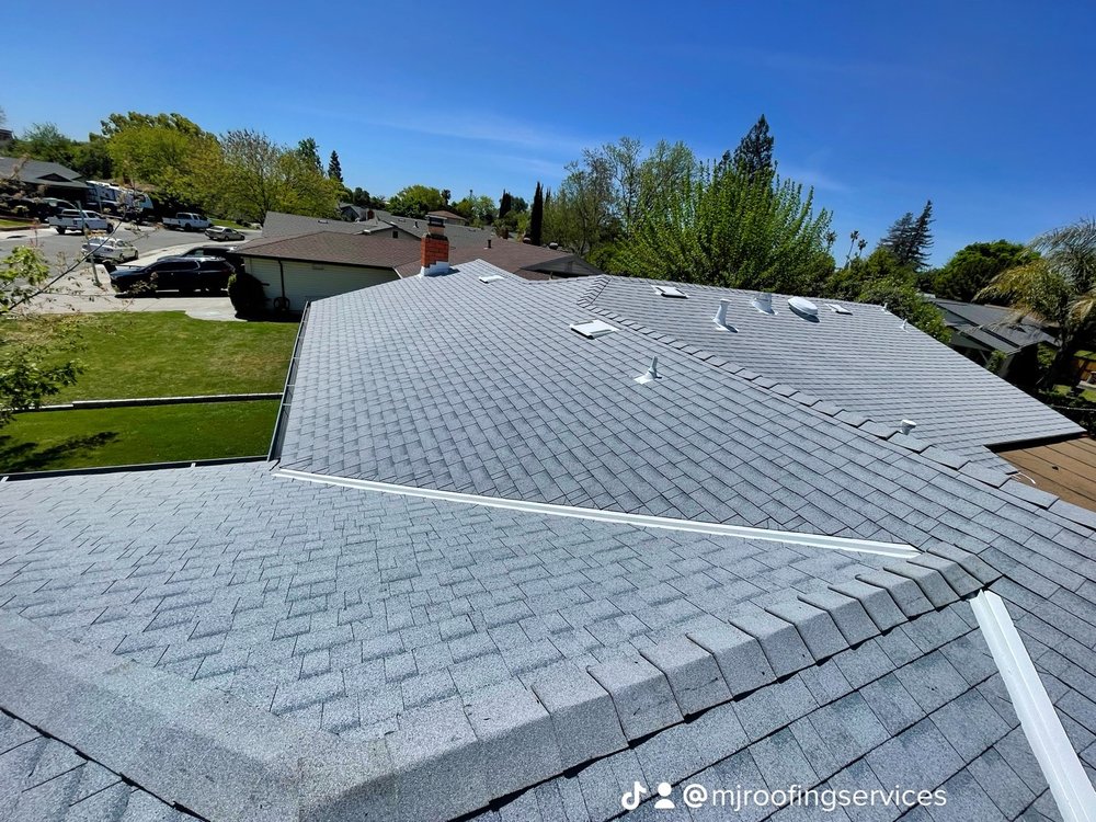 Slide of MJ Roofing Services