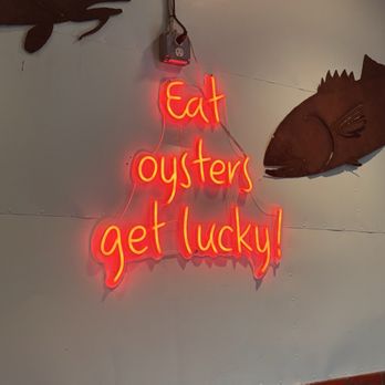 Summer Shack-  Cambridge - Sign on the back entrance wall, also on their shirts - Seafood Near Me - Cambridge, Massachusetts