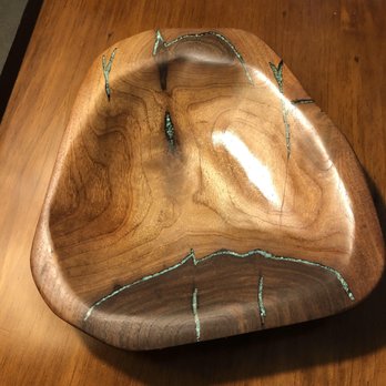 Pena's Place - a wooden bowl on a table - New Mexican Cuisine Near Me - Ruidoso, New Mexico