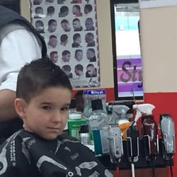 C & C Executive Barber Shop - Ben getting his hair cut with angel