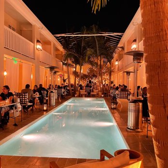Cara Hotel - Poolside seating - Hotels Near Me - Los Angeles, California