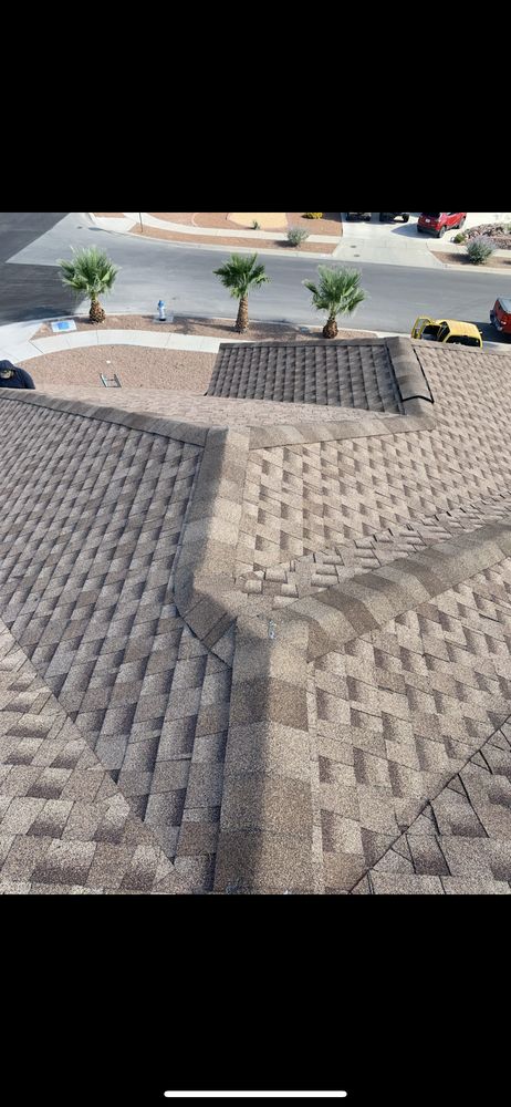 Slide of Mann & Sons Roofing