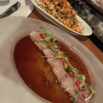 Eddie V's Prime Seafood - Yellowtail Sashimi and Calamari - Seafood Near Me - Austin, Texas Eddie V's Prime Seafood - Yellowtail Sashimi and Calamari - Seafood Near Me - Austin, Texas