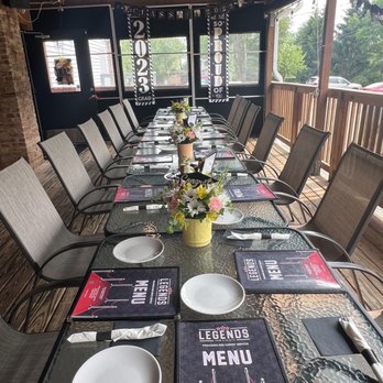 Legends Food & Spirits - a long table set with place settings - Barbeque Near Me - Lake Geneva, Wisconsin Legends Food & Spirits - a long table set with place settings - Barbeque Near Me - Lake Geneva, Wisconsin