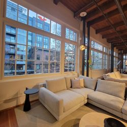 Greenlake Painting - Capitol Hill furniture store. Painted windows from black to white.