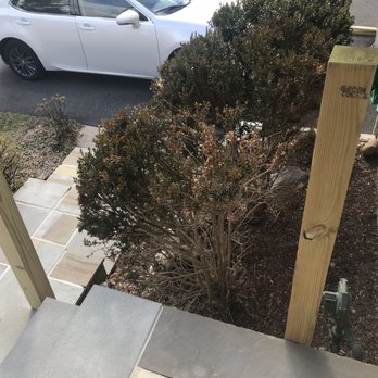 JTG Contracting - Two pieces of wood screwed into the steps base and no handrail made - General Contractors Near Me