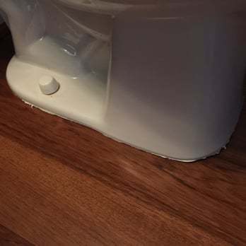 Bathroom Flooring By Toilet Base Of Toilet Caulking Yelp