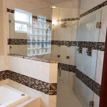 TAZ Construction - a bathroom with a glass shower door - General Contractors Near Me - Albuquerque, New Mexico TAZ Construction - a bathroom with a glass shower door - General Contractors Near Me - Albuquerque, New Mexico